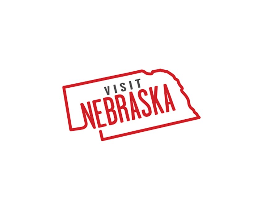 Visit Nebraska written inside an outline of the shape of Nebraska