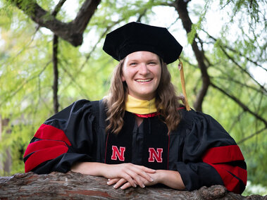 Portrait of Dr. Lindsay Overmyer in her plant health academic regalia
